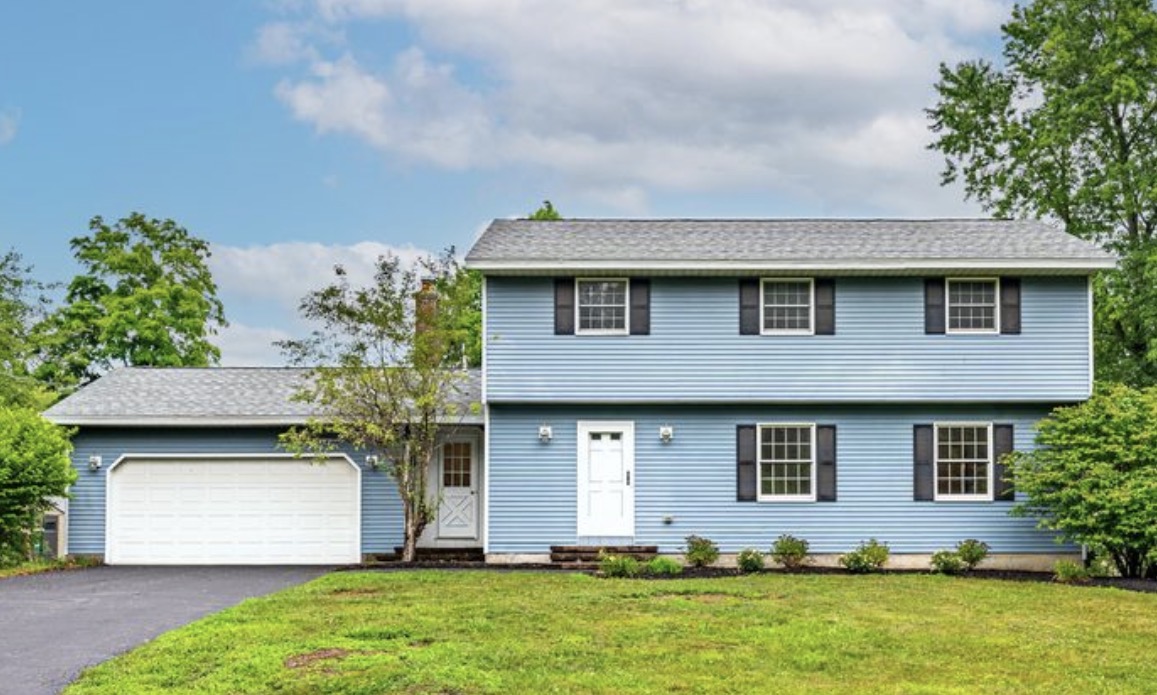 Two-story colonial fix and flip investment property with garage funded in Scotia, NY