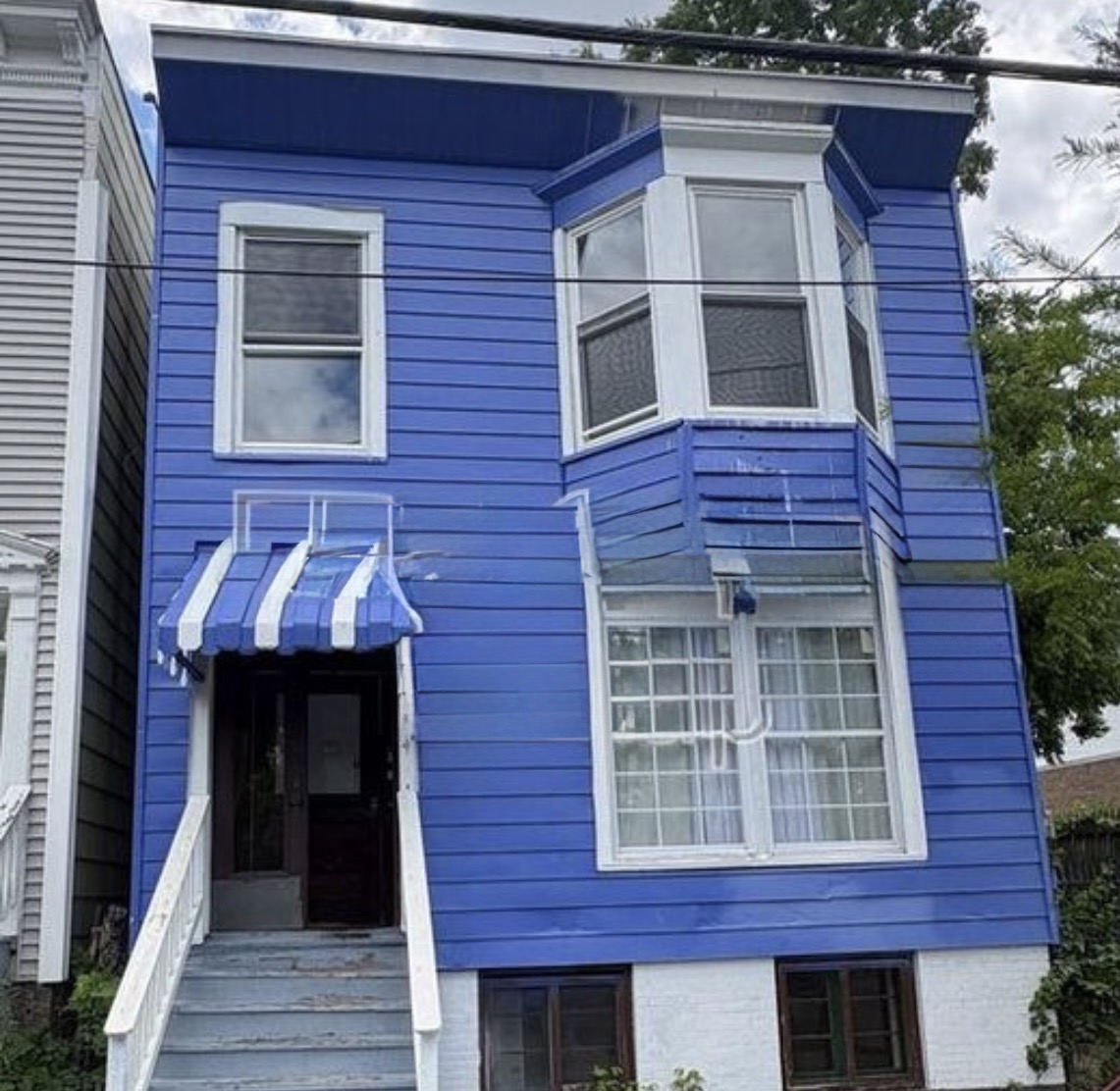 Historic blue townhouse fix and flip investment property funded in Albany, NY
